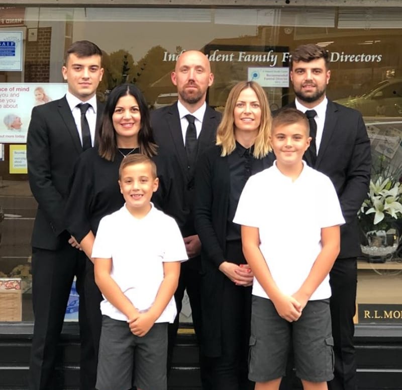  family stood outside their shop in bexleyheath